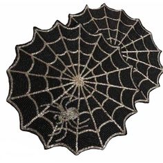 a black and white spider web on a white background