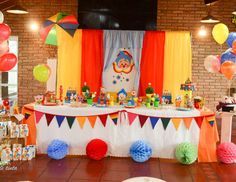 a birthday party with balloons and decorations