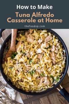 a skillet filled with tuna alfredo and pasta