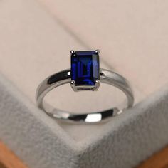 Unique wedding ring blue sapphire ring emerald cut blue | Etsy Wedding Ring Blue Sapphire, Emerald Cut Sapphire Ring, Blue Sapphire Wedding Ring, Ring Blue Sapphire, Unique Wedding Ring, Ring Emerald Cut, September Birthstone Rings, Solitaire Rings, Sapphire Rings