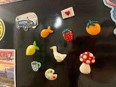 there are many magnets on the fridge to help kids learn how to use them