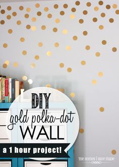 gold polka dot wall decals in a room with bookshelf and bookcase