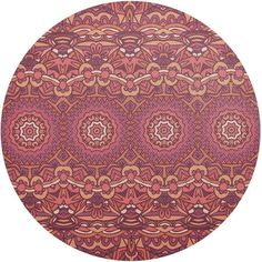 a round rug with an intricate design on the bottom and sides, in red tones