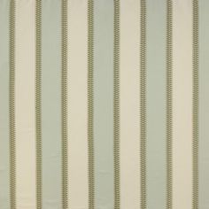 an upholstered wallpaper with white and light blue stripes