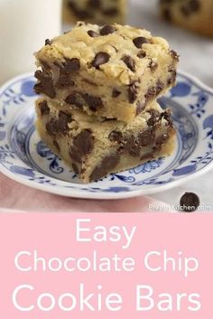 easy chocolate chip cookie bars on a blue and white plate with milk in the background