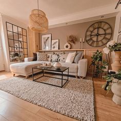 a living room filled with furniture and decor