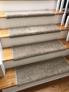 the carpeted stairs are clean and ready to go down