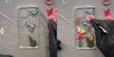 two hands in black gloves are touching some flowers and butterflies on the back of their phone cases