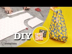 someone is making a bag out of fabric