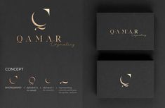 two business cards with the word qamar in gold foil on black and white paper