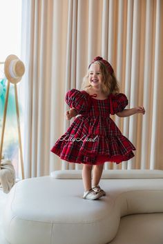 Are you searching for the perfect look for your little fashionista for any special occasion? Our children's dress in checks is the ideal choice! This enchanting dress with puffy short sleeves, flanel ruffles on the skirt, and a delicate bow on the top captivates and adds an unforgettable charm to your little princess's ensemble. Puffy Sleeves: Short sleeves give the dress sophistication and delicacy. Your child will look like a true fairytale heroine! Bow on the top: A delicate small bow adorning the top of the dress adds an unparalleled touch to the look and makes your little princess even more enchanting. Our dresses are crafted with high-quality materials and meticulous attention to detail to ensure comfort and durability. This dress is perfect for various special occasions, including b Weihnachten Outfit, Gown Photoshoot, Baby Girl Gown, Christmas Tutu Dress, Toddler Christmas Outfit, Enchanting Dress, Xmas Outfit, Baby Birthday Dress, Red Tutu