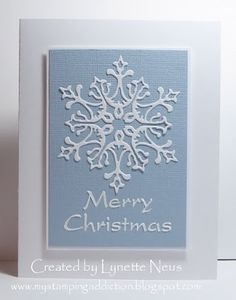 a card with a snowflake design on it