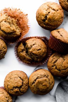 chocolate chip muffins on a marble surface