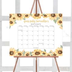 a calendar with sunflowers on it and the words, guess baby someone's birthday