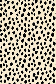 a black and white animal print pattern with spots on the back of it's skin