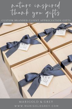 four wooden boxes with black ribbon tied around them and the words, nature inspired thank you gifts