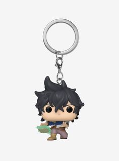 a key chain that has an anime character holding a green object in it's hand