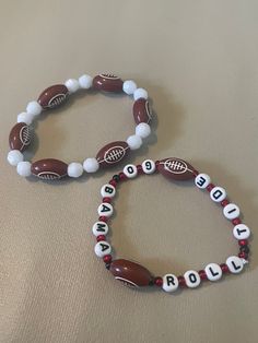 Set of 2 handmade Alabama football beaded bracelets. Diy Football Bracelets, Personalized White Beaded Bracelets For Football Season, Football Bead Bracelet, Nfl Beaded Bracelets, Baseball Bead Bracelet, Alabama Bracelet, Beaded Bracelets Ideas, Boyfriend Bracelet, Football Bracelet