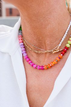 Add a splash of color to your look with our Rainbow Necklace Luxe! This trendy stack showcases a spectrum of vibrant gemstones and has received five-star ratings. Make a statement and show off your unique style with this playful and chic accessory. Product Details: 16" lobster claw 2" extender multi colored mini beads Trendy Crystal Necklace With Beaded Chain, Bold Multicolor Adjustable Necklace, Trendy Rainbow Round Beads Jewelry, Trendy Rainbow Round Bead Jewelry, Trendy Rainbow Necklace For Parties, Trendy Multicolor Round Beads Charm Necklaces, Trendy Multicolor Adjustable Charm Necklaces, Trendy Multicolor Charm Necklaces With Round Beads, Multicolor Summer Jewelry With Faceted Beads