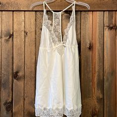 Nwot And Never Worn Soft White Eyelash Lace Racerback Satin Babydoll Slip. Received As A Gift For My Bachelorette Party But Never Wore. Smoke Free Home. Ships Fast. Bundle With Other Listings From My Closet And Save! Feminine Lace Back Camisole, White Sleepwear With Delicate Straps For Wedding Night, White Lace Chemise For Bedtime, White Sleeveless Slip For Wedding Night, White Cami Sleepwear With Built-in Bra, White Cami Sleepwear With Lace Trim, White Delicate Lace Camisole For Sleep, White Sleepwear With Delicate Straps For Bedtime, White Lace Trim Cami Sleepwear