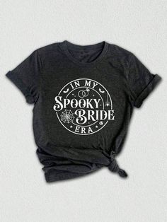 Introducing our "In My Spooky Era" T-shirt, perfect for brides who love to embrace their spooky side! This unique design captures the essence of the spooky season and showcases the pride of a bride-to-be. Crafted with love and attention to detail, this shirt will make a memorable gift for brides, bridesmaids, or as a bridal shower surprise.  Embrace the bride's love for Halloween with our "In My Spooky Era" shirt. Whether she's a die-hard Halloween enthusiast or simply loves the eerie charm of t Unique Bride Gifts, Spooky Bride, Perfect Bridal Shower Gift, Bridesmaid Shirt, Bride Sweatshirt, Bachelorette Shirt, Spooky Gifts, Wedding Plan