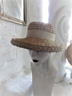 "STYLISH BEIGE 60's SUN HAT This stylish hat is a fashion statement that would work for any era--a good choice for an afternoon garden party, wedding or day at the races...or a stroll down the sidewalk! It is well made despite no maker's label, in a color that will go with almost anything. It has a hatband of beige with a 2 tone grosgrain ribbon in brown and beige at the back and would be ideal for brown spectator pumps. A vintage treasure to last another lifetime or 2! Very good to excellent co Retro Wide Brim Sun Hat For Summer, Retro Summer Vacation Straw Hat, Retro Wide Brim Summer Hat, Natural Cloche Hat For Spring, Retro Brimmed Hat For Garden Party, Vintage Flat Brim Straw Hat For Kentucky Derby, Vintage Cloche Hat For Garden Party, Retro Brimmed Sun Hat For Summer, Vintage Hats For Spring Vacation