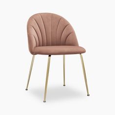 a pink chair with gold legs on a white background