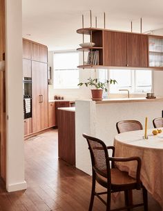 the kitchen is clean and ready to be used as a dining room or living room