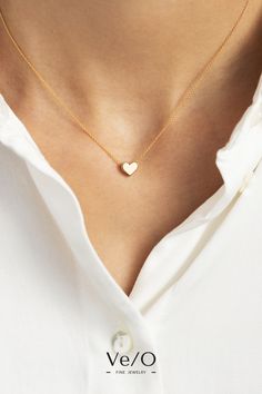 This piece looks gorgeous when layered with other VE/O pieces or worn delicately on its own. Steeped in symbolism, it makes a great gift for someone you love whether that be for an anniversary, graduation or Bat Mitzvah.  Available in your choice of 14K yellow, rose or white gold plated rhodium, you will be tempted to get one of each for every occasion. Minimalist Everyday Charm Necklace With Heart Charm, Minimalist Everyday Necklace With Heart Charm, Minimalist Everyday Charm Necklace With Heart, Simple Heart Necklace With Delicate Chain For Everyday, Simple Heart Pendant Necklace For Everyday, Minimalist Necklace With Heart Detail For Everyday, Simple Everyday Charm Necklace With Heart, Dainty Small Heart Necklace For Everyday, Minimalist Everyday Necklace With Heart Detail