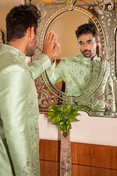 Shop for Darshika Menswear Green Silk Embroidered Sherwani Kurta Set for Men Online at Aza Fashions Traditional Raw Silk Sherwani With Mirror Work, Wedding Nehru Jacket With Mirror Work, Festival Bandhgala With Mirror Work For Reception, Festival Reception Bandhgala With Mirror Work, Designer Mirror Work Sherwani Straight Kurta, Designer Sherwani With Mirror Work, Designer Raw Silk Bandhgala With Mirror Work, Straight Kurta Sherwani With Mirror Work In Raw Silk, Bollywood Style Ceremonial Sherwani With Mirror Work