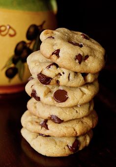 a stack of cookies sitting on top of a wooden table