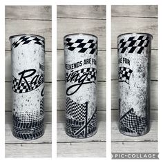 three shot glasses with racing designs on them sitting side by side in front of a wooden wall