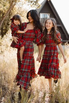 Flowy, darling, and winter princess approved. Everything this carefree midi-length girl's dress is made of. Inspired by holiday parties, family time, and playing with cousins or friends. Featuring a smocked bodice with puff sleeves, square neckline and ruffle detailing. Available for a limited time in our favorite festive print...HOLIDAY PLAID! Mother Daughter Christmas Outfits, Girls Christmas Dress, Winter Princess, Christmas Dresses, Daughter Christmas, Holiday Plaid, Tiered Ruffle Skirt, Girls Christmas Dresses, Christmas Photoshoot