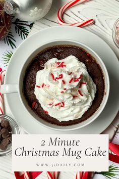 two minute christmas mug cake with whipped cream and candy canes