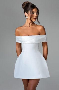 This oh-so-romantic, yet modern style is top of our wishlists. Make a statement in Delta, designed with a contrast bardot neckline that shows off your shoulders, and adorned with a dreamy bow detail to the back. In a playful mini length, the look is complete with a rounded, bubble shape skirt.     Colour: Ivory.  Premium non-stretch crepe.  Fully lined.  Contrast bardot neckline.  Bow detail to back.  Rounded, bubble shape skirt.  Invisible zipper fastening.  Mini length.   Size: XS, S, M, L, XL White Off Shoulder Party Dress With Straight Neckline, White Off Shoulder Dress With Straight Neckline For Party, Chic White Strapless Off Shoulder Dress, White Off Shoulder Party Dress With Sweetheart Neckline, White Off-shoulder Party Dress With Sweetheart Neckline, White Off Shoulder Dress With Sweetheart Neckline For Party, Chic White Off Shoulder Dress For Evening, Chic White Off-shoulder Mini Dress, Chic White Off-shoulder Dress With Straight Neckline