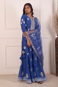 Sky blue hand block foil print straight kurta. Paired with a gharara and organza dupatta with lace detailing.
Components: 3
Pattern: Embroidered
Type Of Work: Digital print
Neckline: Notched
Sleeve Type: Three-quarter
Fabric: Kurta and Gharara: Chanderi, Dupatta: Organza
Color: Blue
Other Details: 
Length:
Kurta: 34 inches
Gharara: 40 inches
Dupatta: 2.5 mtrs
Occasion: Mehendi and Haldi - Aza Fashions Indigo Block Print Sets For Diwali, Festive Indigo Sets With Block Print, Festive Indigo Block Print Set, Blue Anarkali Embroidered Sharara, Blue Block Print Chanderi Salwar Kameez, Chanderi Block Print Blue Salwar Kameez, Blue Block Print Chanderi Kurta, Blue Chanderi Kurta With Block Print, Festive Block Print Straight Kurta Sharara