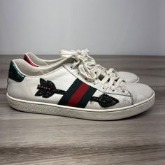 Gucci Ace Sneakers Women's Sz 37.5 Embroidered Arrow White Leather Crystal Shoe Pre Owned Condition. Shows Wear, Heel Drag, Missing Jewels, Scuffs. See Photos. Please See All Pictures As They Are Part Of The Description. You Will Receive The Exact Item That You See In The Photos. Same Day Shipping On Items Purchased Before 3:00 P.M Cst Mon-Fri. Unless Stated Items Are Pre Owned And Will Show Normal Wear. Please Ask Any Questions That You May Have As I Am Happy To Answer. Thank You For Your Interest. Gucci Ace Sneakers, Crystal Shoes, Gucci Shoes, White Leather, Womens Shoes Sneakers, Womens Sneakers, Athletic Shoes, Shoes Sneakers, Shoe Accessories