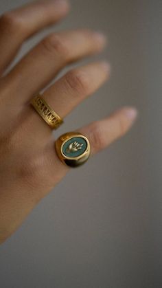 Signet ring is a wearable form of identification and communication. It underlines the belonging of its owner to a secret society and/or involvement in specific knowledge as well as a powerful personal message to the surroundings.Signets are made of 24 k gold plated bronze. Patinated planes are featuring five ancient hand gestures as a form of personal manifesto.Mano Figa - FEMININITY. Strong symbol of the feminine devine, fertility, is also used to scare away failures and the evil eye. Pinky Signet Ring, Signet Rings Women, Mens Rings Fashion, Secret Society, Girly Jewelry, Dream Jewelry, Jewelry Inspo, Men's Rings, Signet Ring