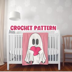 a crochet blanket with a ghost holding a heart in the middle and text crochet pattern on it