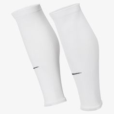 Nike Strike Sleeves Socks These sleeves show off your soccer fandom, while the sweat-wicking technology and stretch fabric will help keep you dry and comfortable on the pitch. Nike Dri-FIT technology moves sweat away from your skin for quicker evaporation, helping you stay dry and comfortable. Stretch design fits comfortably over your shin guard. Shin Guard, Soccer Socks, Shin Guards, Nike Soccer, The Pitch, Red Nike, Football Kits, Sports Gear, Nike Zoom