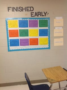 a bulletin board on the wall in a classroom