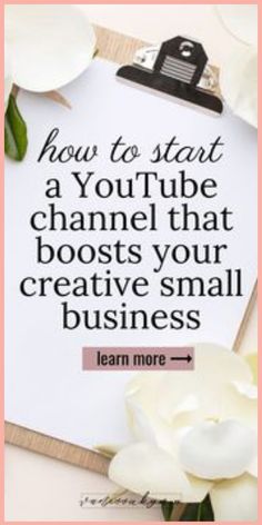 a white flower sitting on top of a piece of paper next to a clipboard with the words how to start a youtube channel that boots your creative small business