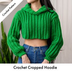 a woman wearing a green cropped hoodie with the words crochet written below it