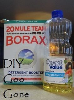 a bottle of borax sitting next to a box of deodorant