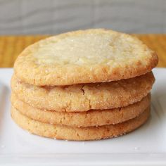 a stack of cookies sitting on top of a white plate