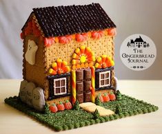 a gingerbread house is decorated with candy