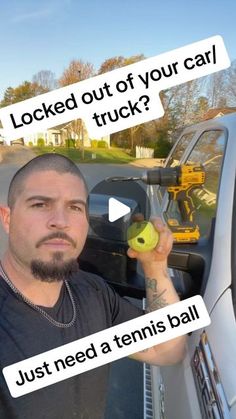 a man holding up a tennis ball in front of a truck with the words locked out of your car?