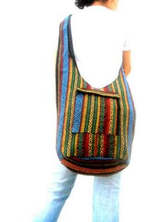 "This Beautiful Multi color Bag This is a convenient very comfortable colorful bag and suitable for everyone. Multi color Cross Body Shoulder Bag Top zipper closure with Front zipper pocket This bag is fully black lined interior This bag is 100% cotton Measurements Size (Approx): Length: 15\" Height: 17\" Width: 7\" Strap Drop: 45\" Color : Multi color Please Visit our store: https://www.etsy.com/shop/Avivahandmade Thank You For Watching" Rectangular Bags With Pockets For Festivals, Multicolor Shoulder Bag With Pockets For Daily Use, Multicolor Shoulder Bag With Pockets For Festival, Multicolor Shoulder Bag With Cell Phone Pocket For Festival, Bohemian Multicolor Shoulder Bag With Cell Phone Pocket, Hippie Multicolor Shoulder Bag For Daily Use, Bohemian Multicolor Bags With Pockets, Multicolor Festival Shoulder Bag With Pockets, Blue Bohemian Bags With Pockets