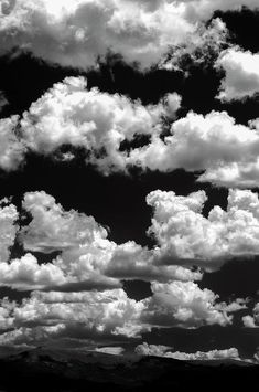 black and white photograph of clouds in the sky