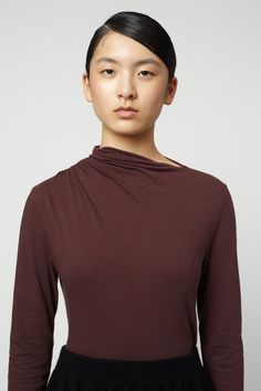 Close fitting knit top in our organic soft textured cotton jersey.  Asymmetric gathering at shoulder and neckline create a fresh, sharp look.   Wear as an unconventional base layer, or on its own for a lean, sensual look.  - Gathered assymetric neckline- Long sleeve  - Close fit through body- Fall to mid / low hip Fabr Rib Top, Base Layer, Sock Shoes, Skirt Pants